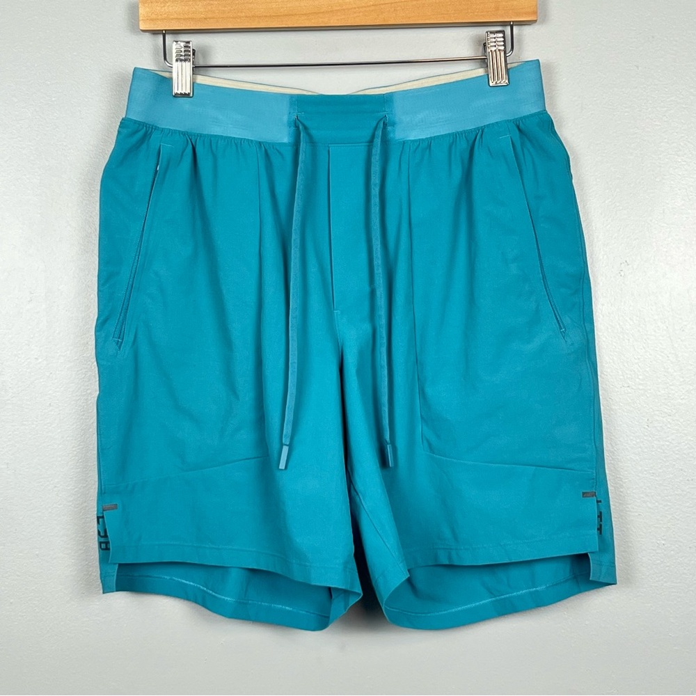 Lululemon men’s aqua blue License to Train Linerless 7” shorts, medium.